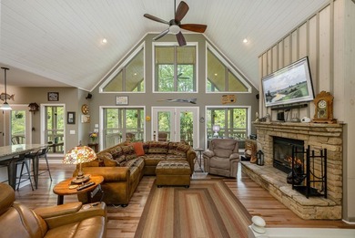 LAKEFRONT living and mountain tranquility in this beautifully - photo 9