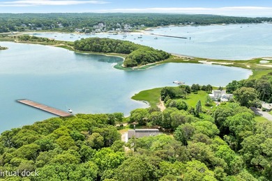 Set on over 3 private acres along the protected shores of - photo 3