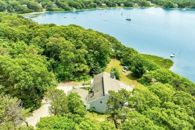 Set on over 3 private acres along the protected shores of - photo 7