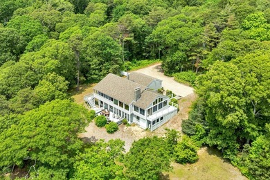 Set on over 3 private acres along the protected shores of - photo 9