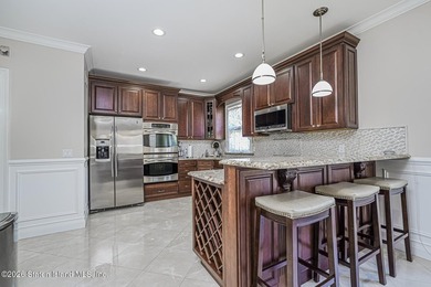 Welcome to 1 McClean Avenue, a beautifully renovated - photo 3