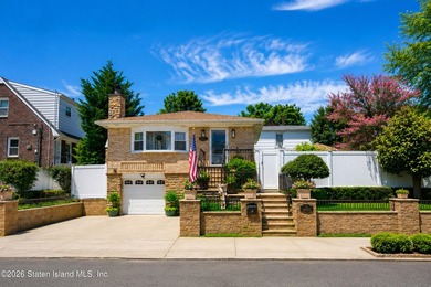 Welcome to 103 Cedar Avenue, a beautifully renovated raised - photo 1