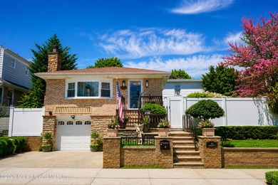 Welcome to 103 Cedar Avenue, a beautifully renovated raised - photo 2