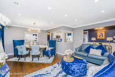 Welcome to 103 Cedar Avenue, a beautifully renovated raised - photo 3