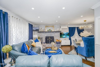 Welcome to 103 Cedar Avenue, a beautifully renovated raised - photo 6