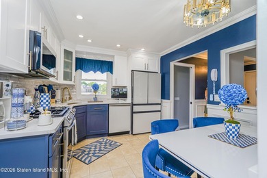 Welcome to 103 Cedar Avenue, a beautifully renovated raised - photo 9