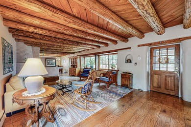 HUGE PRICE REDUCTION. A beautiful 2,588 square foot adobe home