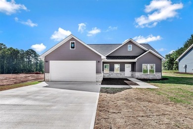 New construction with lake access now available! Three bedrooms - photo 1