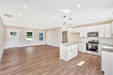 New construction with lake access now available! Three bedrooms - photo 3