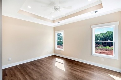New construction with lake access now available! Three bedrooms - photo 5