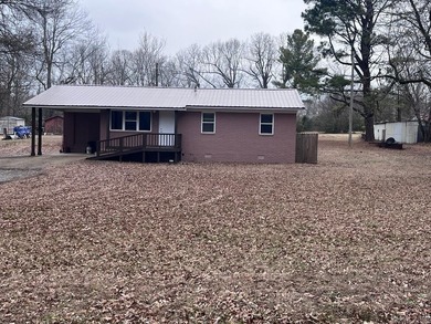 Adorable 2 bedroom, 2 bath home on 1 +/- acre.  Located at the