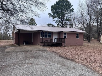 Adorable 2 bedroom, 2 bath home on 1 +/- acre.  Located at the