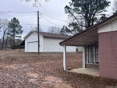 Adorable 2 bedroom, 2 bath home on 1 +/- acre.  Located at the