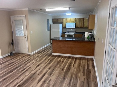 Adorable 2 bedroom, 2 bath home on 1 +/- acre.  Located at the