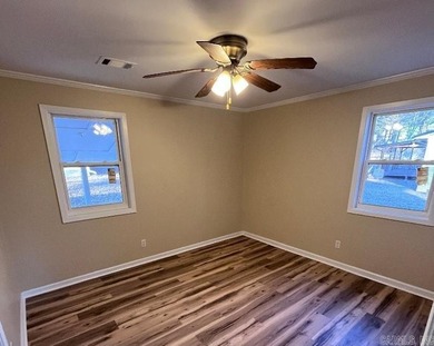 Adorable 2 bedroom, 2 bath home on 1 +/- acre.  Located at the