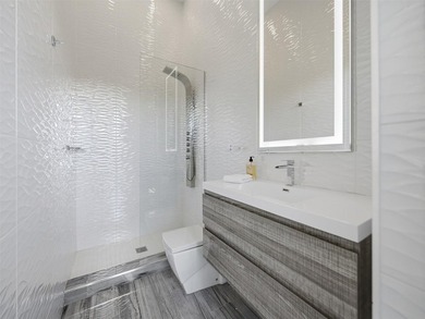 Designed & built by Prestige Design Homes,this turn-key estate - photo 17