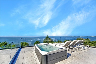 Breathtaking Waterfront Estate with Panoramic Bay Views. Located - photo 19