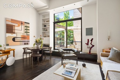 *A Design-Driven West Village Loft with Architectural Details - photo 1