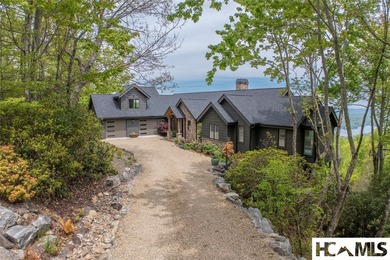 Perched within a quiet cul-de-sac in Lake Toxaway Estates, this - photo 1