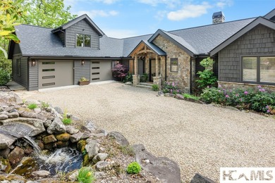 Perched within a quiet cul-de-sac in Lake Toxaway Estates, this - photo 2