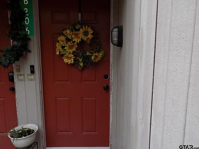 This 2-bedroom, 2 bath condo is a great way to live in the gated - photo 2