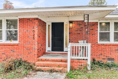 Welcome to 1025 Manigault Dr! This updated 3-bedroom, 2-bath - photo 4