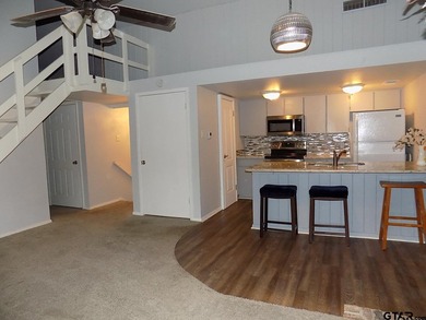 This 2-bedroom, 2 bath condo is a great way to live in the gated - photo 4