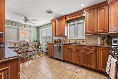 Welcome to 4711 Hylan Boulevard, a beautiful detached - photo 10