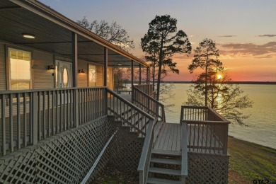 Bring the outdoors inside with this gorgeous home on the - Lake Home For Sale in Pittsburg, Texas