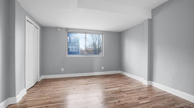 Presenting a beautifully renovated four-level, two-family - photo 12