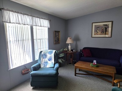 THIS HOME IS ON LEASED LAND WITH A MONTHLY LOT RENT AT $650 AND - photo 12