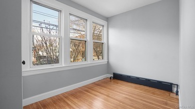 Presenting a beautifully renovated four-level, two-family - photo 16