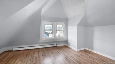 Presenting a beautifully renovated four-level, two-family - photo 17