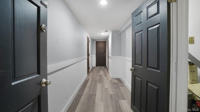 Presenting a beautifully renovated four-level, two-family - photo 21