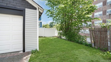 Presenting a beautifully renovated four-level, two-family - photo 23