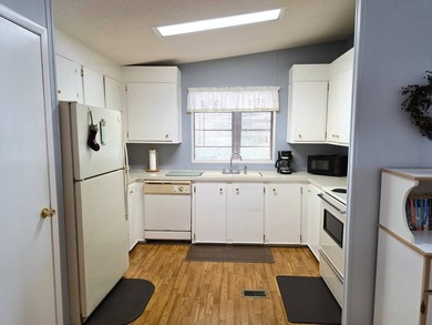 THIS HOME IS ON LEASED LAND WITH A MONTHLY LOT RENT AT $650 AND - photo 23