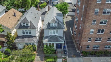 Presenting a beautifully renovated four-level, two-family - photo 25