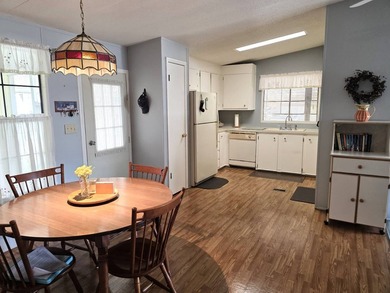 THIS HOME IS ON LEASED LAND WITH A MONTHLY LOT RENT AT $650 AND - photo 32