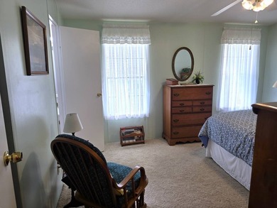 THIS HOME IS ON LEASED LAND WITH A MONTHLY LOT RENT AT $650 AND - photo 39