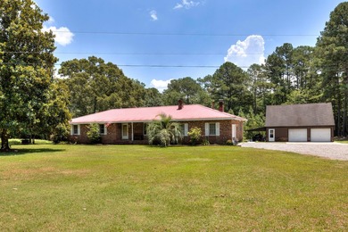 Enjoy country living on this 10-acre property with two homes - photo 1