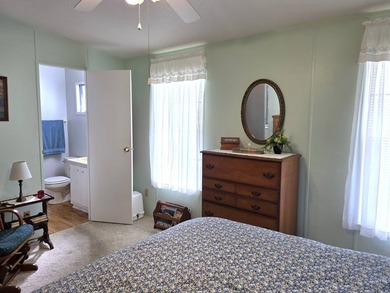 THIS HOME IS ON LEASED LAND WITH A MONTHLY LOT RENT AT $650 AND - photo 42