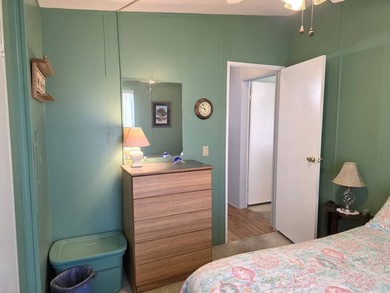 THIS HOME IS ON LEASED LAND WITH A MONTHLY LOT RENT AT $650 AND - photo 57
