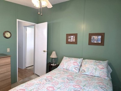 THIS HOME IS ON LEASED LAND WITH A MONTHLY LOT RENT AT $650 AND - photo 58