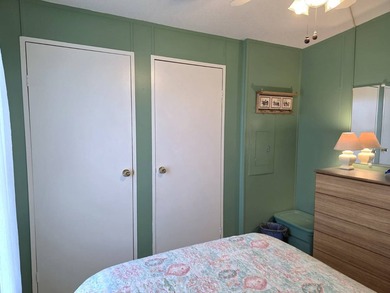THIS HOME IS ON LEASED LAND WITH A MONTHLY LOT RENT AT $650 AND - photo 59