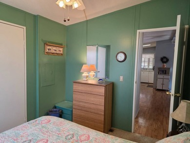 THIS HOME IS ON LEASED LAND WITH A MONTHLY LOT RENT AT $650 AND - photo 60