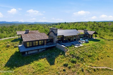 Set on 160 private acres in the heart of Wolf Creek Ranch, this - photo 2