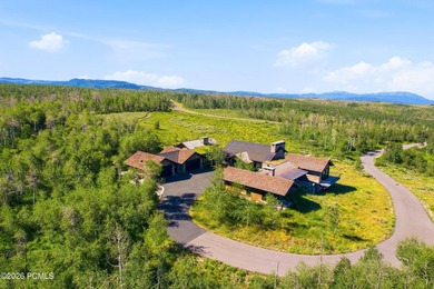 Set on 160 private acres in the heart of Wolf Creek Ranch, this - photo 4