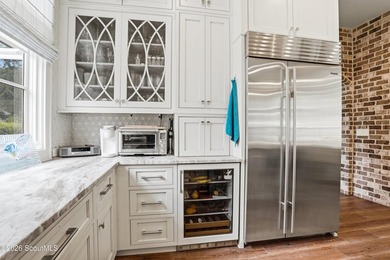 Experience unparalleled luxury in this exceptional island home - photo 20