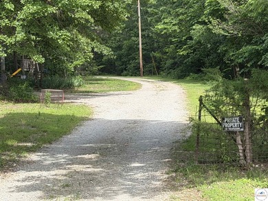 Tucked away at the end of a dead-end road, this beautifully - photo 2