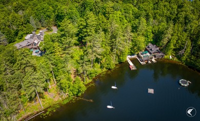 This extraordinary custom-built estate perched along the shores - photo 3